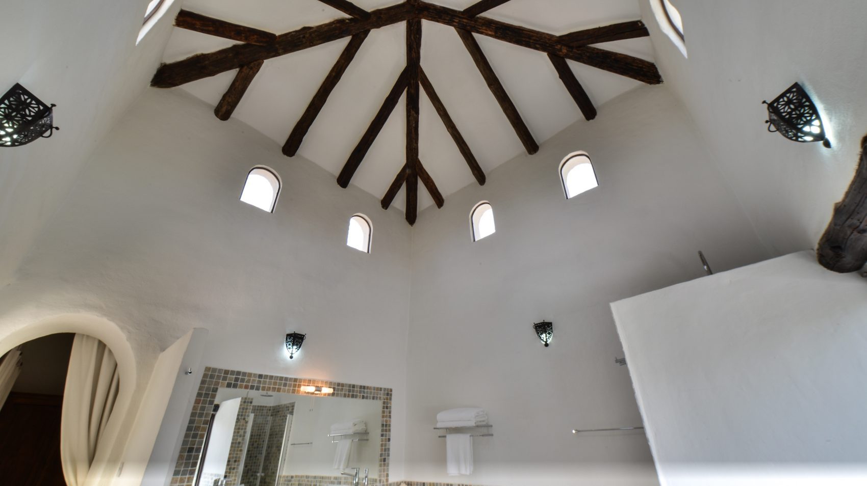 Under a domed ceiling